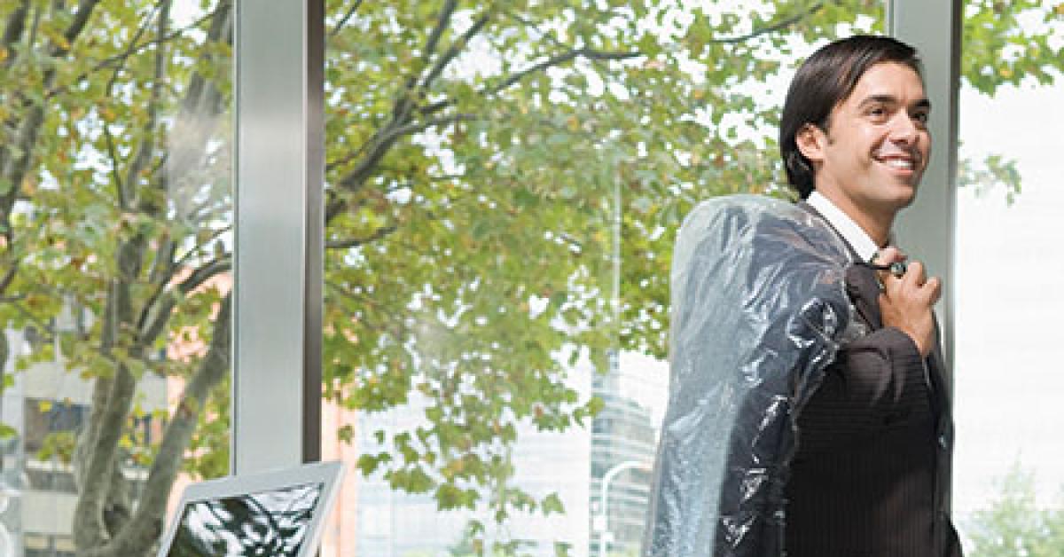 02c86186 suit guy with dry cleaning bag web