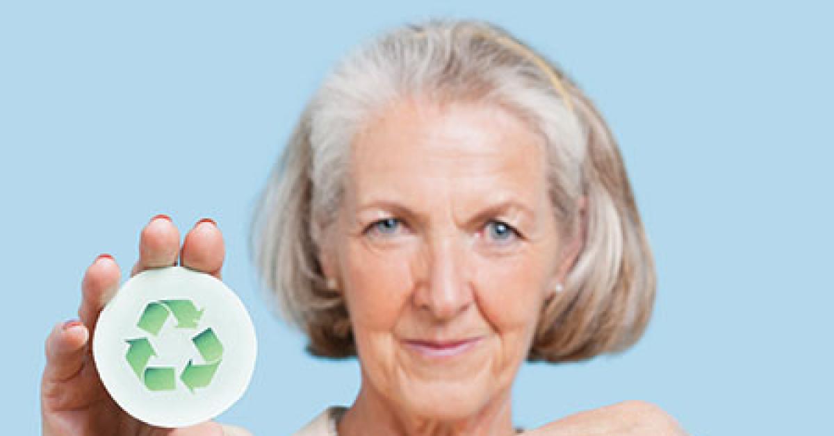 03b92392 older woman pointing at reclcle logo button web