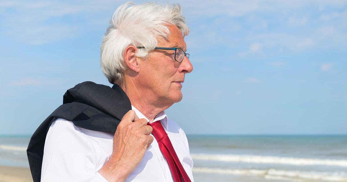 13840 33887 older guy with coat on shoulder web