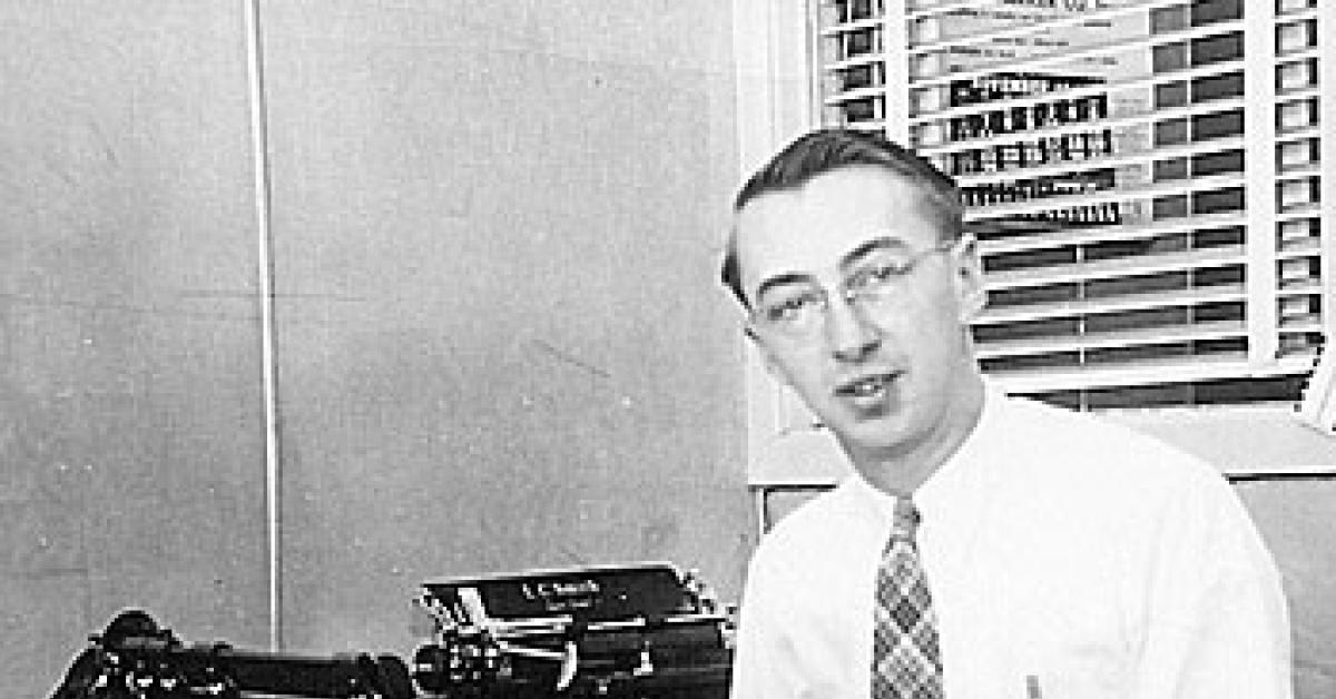 Leland Bierbaum at desk