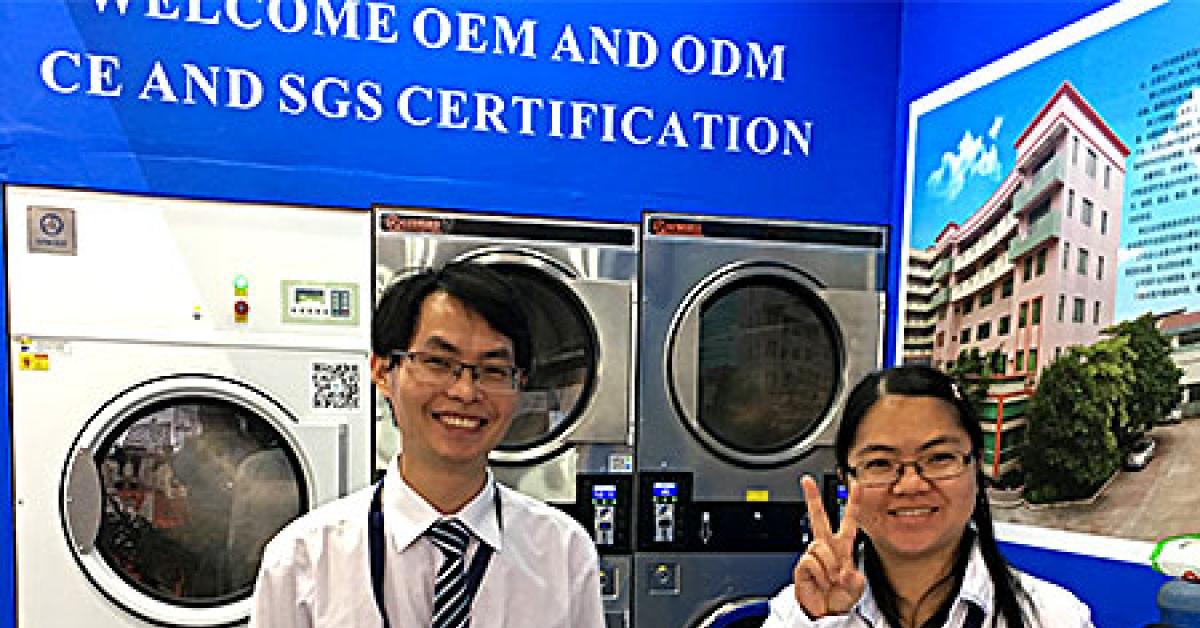 texcare asia 2017 two young people at booth smiling img 1812 web