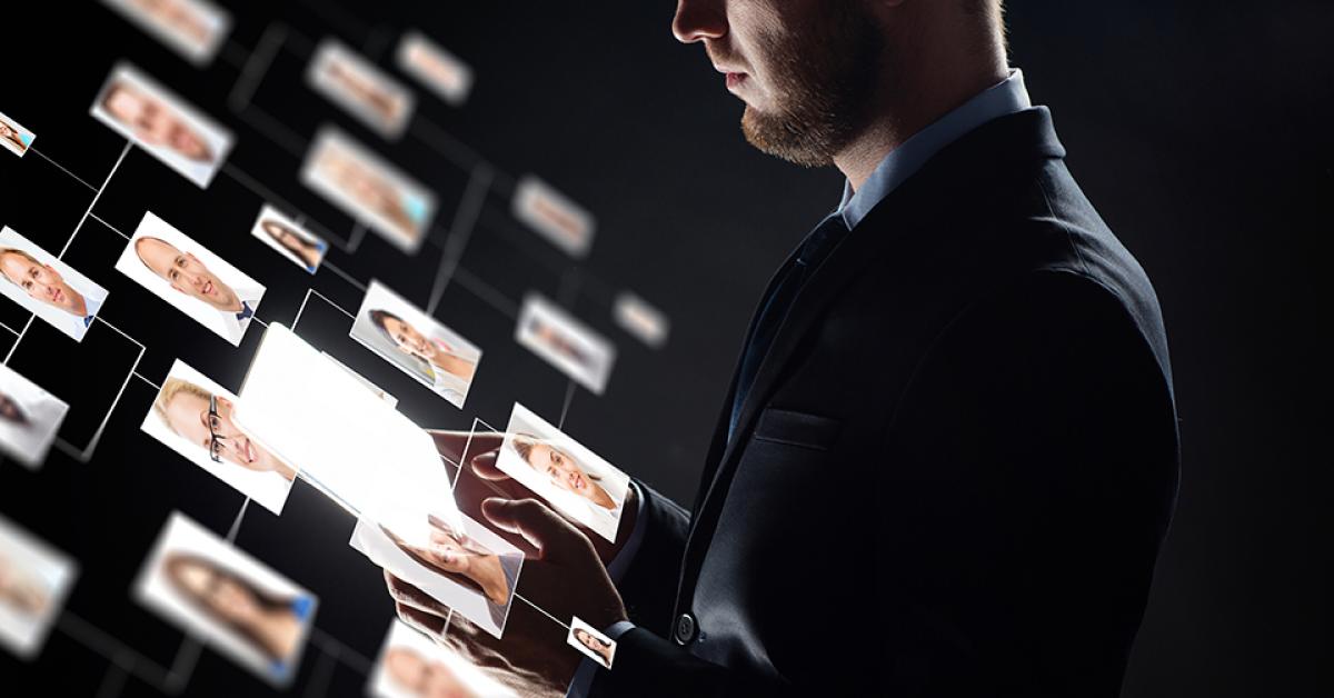 Man selecting applicatants from an array of choices