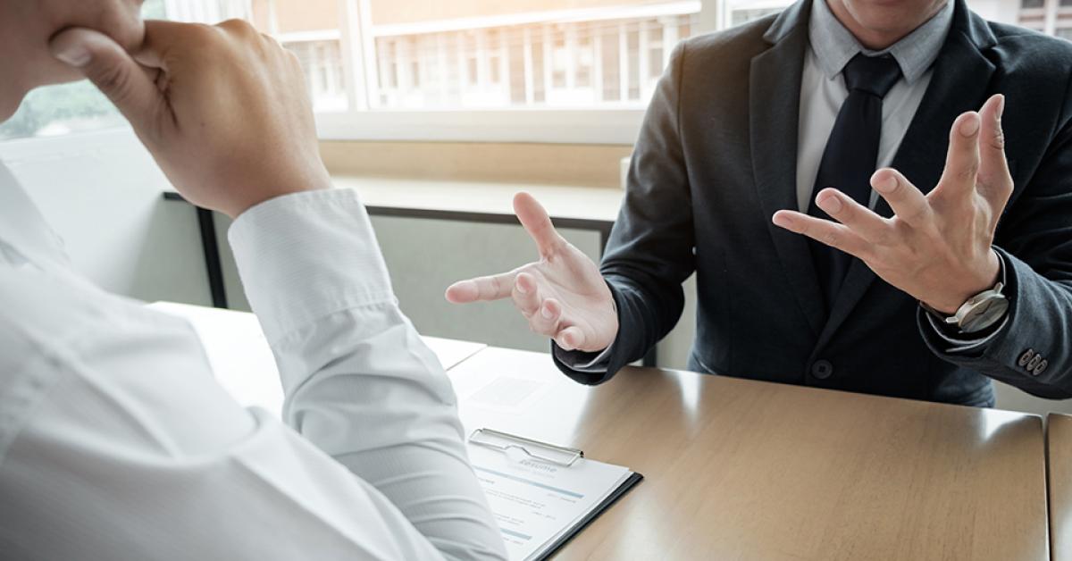 Two men at a job interview