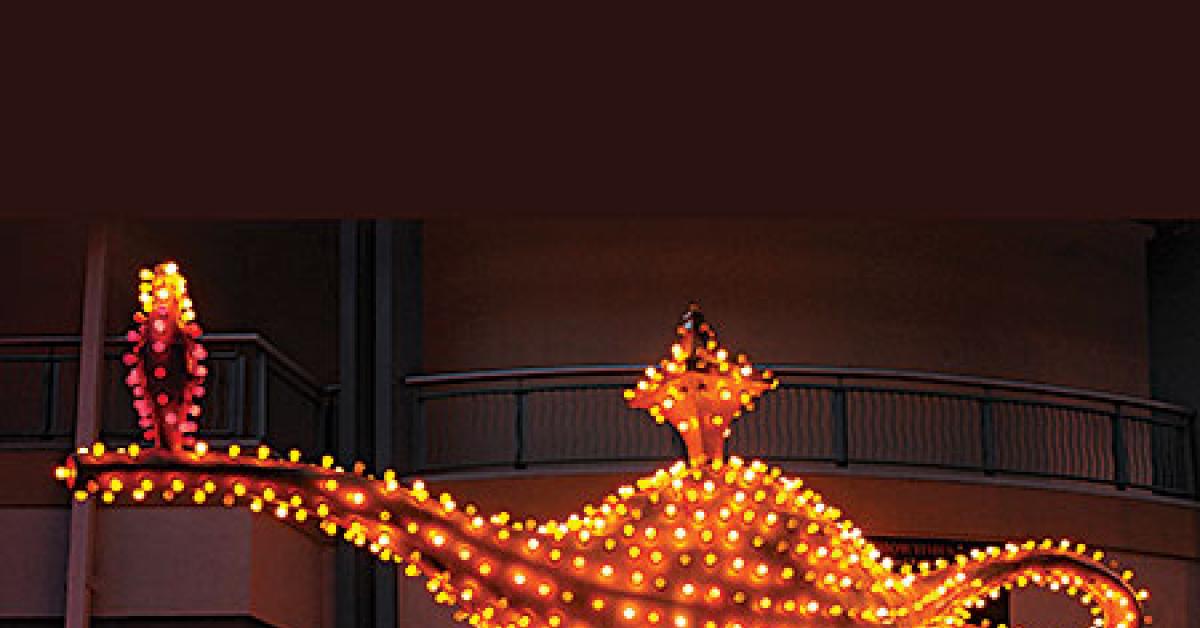 neon museum lamp lit in gallery web