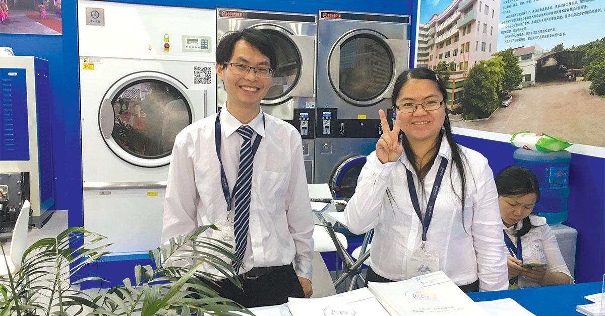 texcare asia 2017 two young people at booth smiling web