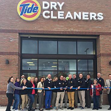 tide official ribbon cutting at tide dry cleaners 50th grand opening 2 web